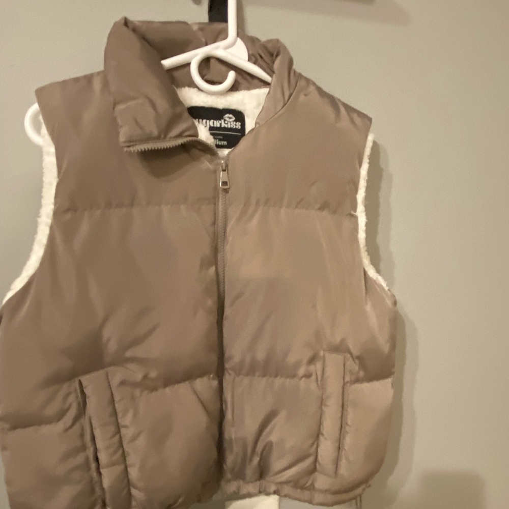 Pinkish tan puffer vest fleece lining